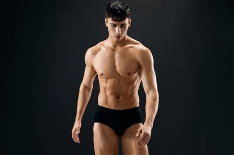 Premium Photo Handsome Sporty Man With Naked Muscled Body Dark Panties Studio High Quality Photo