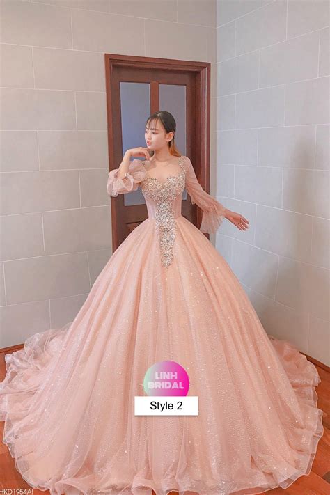 Light Nude Pink Beaded Bodice Long Sleeves Sparkle Ball Gown Wedding Dress With Short Train
