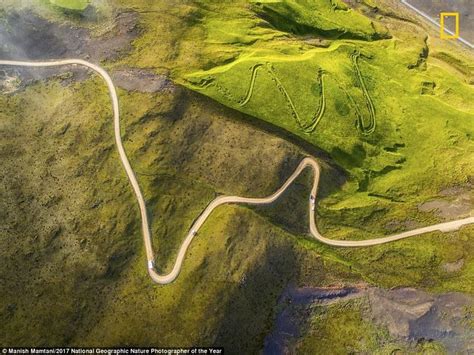 An Aerial View From A Drone Of A Mountain Road That The Photographer