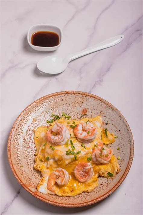 Creamy Omelette With Shrimps On Rice Served Fish Sauce Thai Style