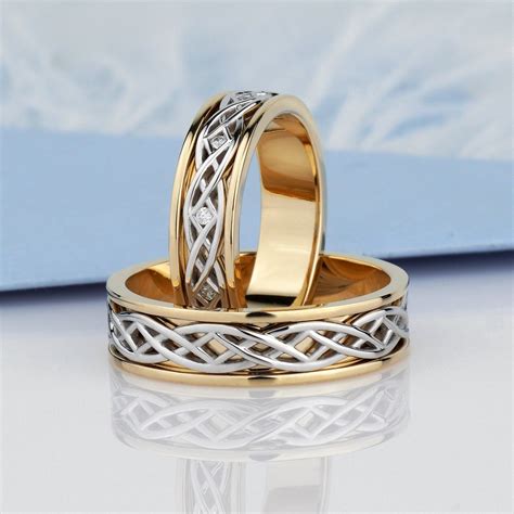 Two-tone wedding rings set with unique design. Gold wedding bands set