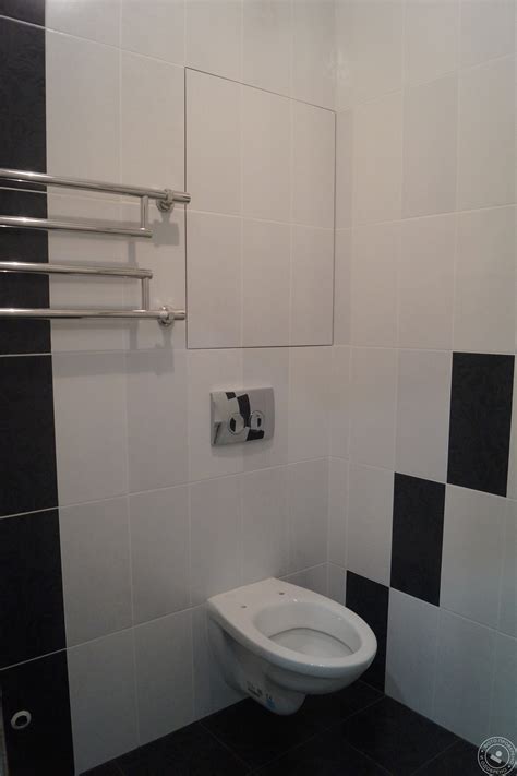 Полотенцесушитель над инсталляцией в интерьере (50 фото) - красивые ...