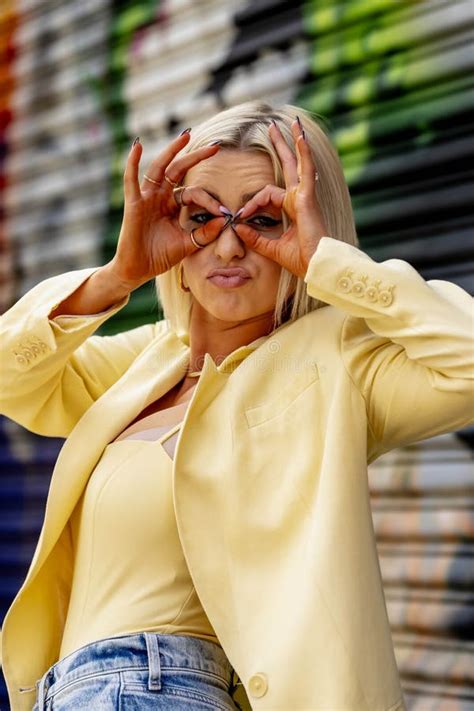 A Lovely Blonde Model Poses Outdoor While Enjoying The Spring Weather Stock Photo Image Of