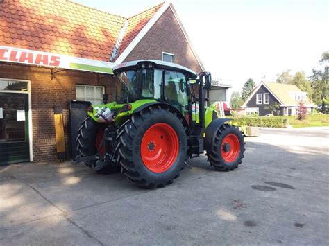 Claas Arion 410 – Landbouwmechanisatiebedrijf Nijenhuis-Zwiep