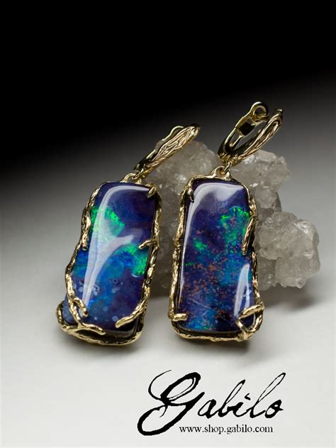 Золотые серьги с ярким болдер опалом код 6788