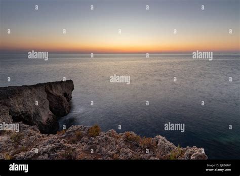 Amazing Sunrise Over The Rising Cliffs And Rocks In Malta With