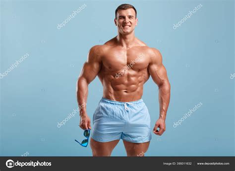 Handsome Muscular Man Naked Torso Abs Isolated Blue Background Fitness Stock Photo By Nikolas