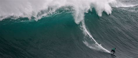 Video Shows Man Surf Absolute Monster Of A Wave In Record Breaking