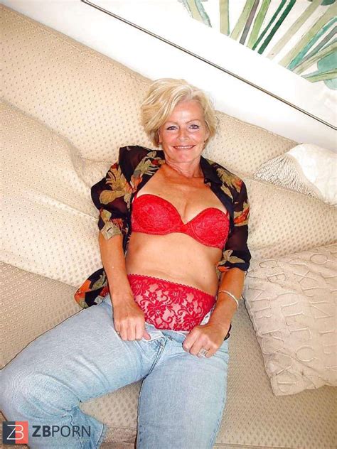 Justine A Mature Platinum Blonde Disrobing In The Living Apartment Zb Porn