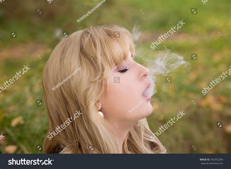 Sexy Blonde Big Breasts Smokes Hookah Stock Photo 542552299 Shutterstock
