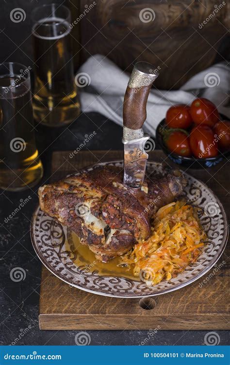 Junta Da Carne De Porco Cerveja E Chucrute Imagem De Stock Imagem