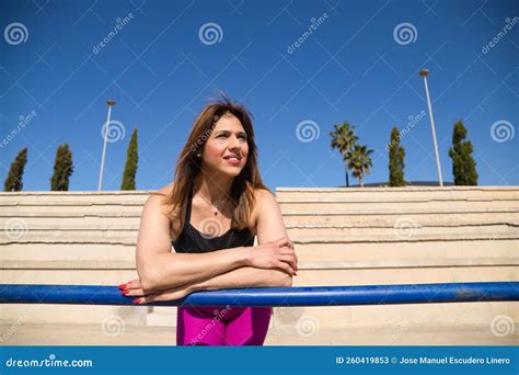 Beautiful Mature Woman With Long Hair Is Looking At The Horizon