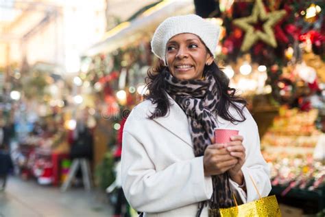 Happy Latina With Paper Cup Of Coffee Visiting City Christmas Fair Stock Photo Image Of