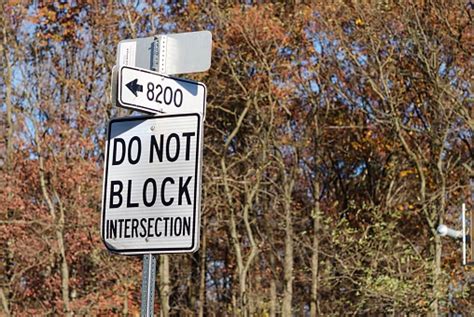 Do Not Block Intersection Road Sign Stock Photo - Download Image Now - 2015, Authority, Autumn ...