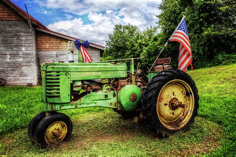 American Tractor Photograph By Debra And Dave Vanderlaan