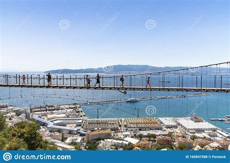 Tourists Walking On Windsor Suspension Bridge Gibraltar Editorial Stock