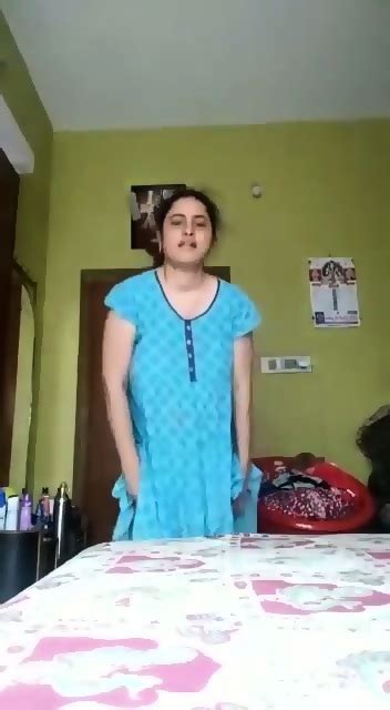 Beautiful MILF Undressing Herself