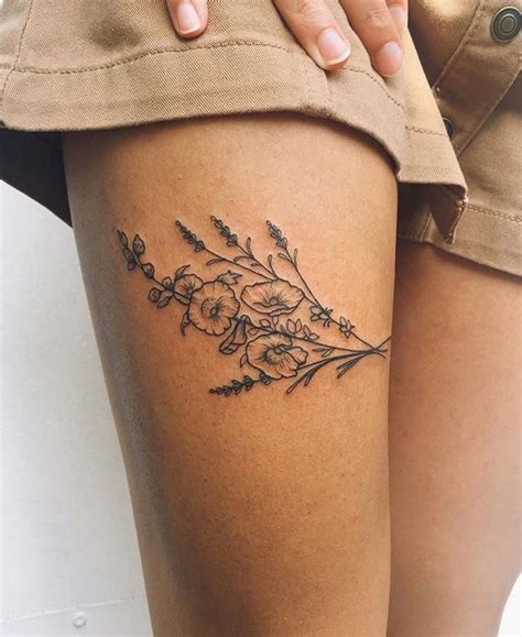 Simple Thigh Tattoos For Females