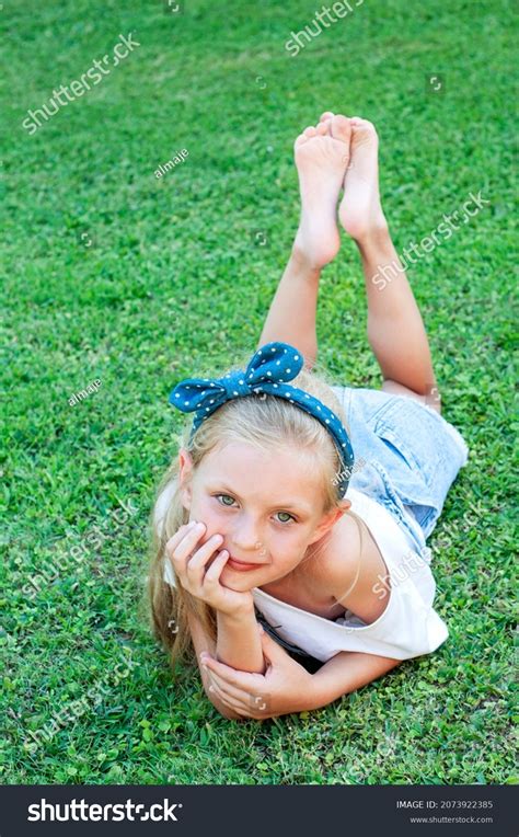 Сheerful Little Girl Denim Jumpsuit Lying Stock Photo 2073922385 ...