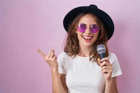 Beautiful Brunette Woman Singing Song Using Microphone Smiling Happy