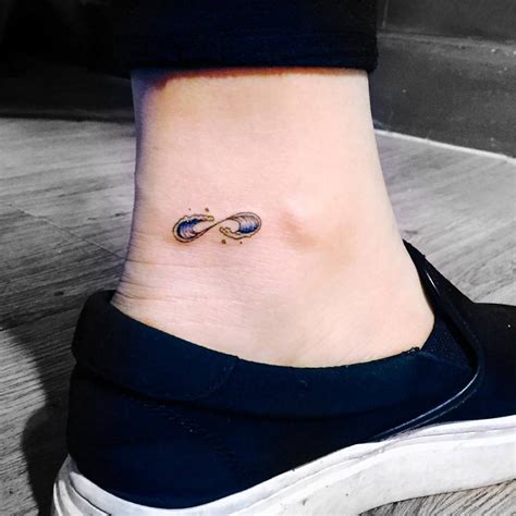 Infinity Wave Tattoo On The Left Inner Ankle