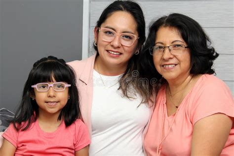 Latina Grandmother Mom And Daughter With Glasses Show Their Love And Support To Celebrate