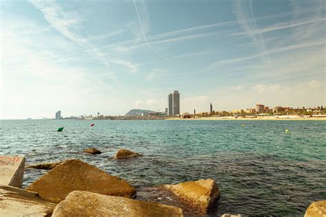 Two Skyscrapers on Shore of BarcelonaFree Stock Photo