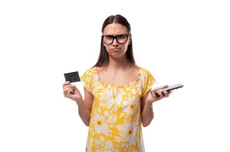 Year Old Brunette Woman Dressed In A Summer Outfit Is Embarrassed And Holds A Plastic Card In