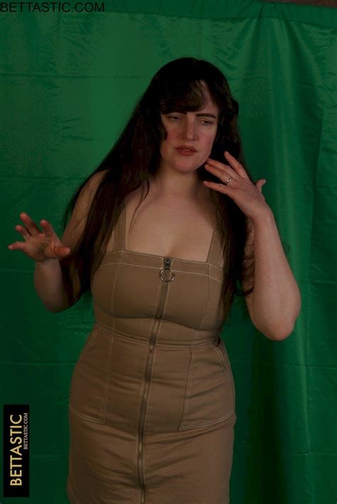 Brunette Chick Takes Off Her Dress And Shows Her Big Ass Photos