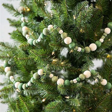 Hanging Bead Garland On A Christmas Tree