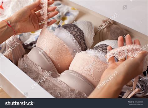 Woman Choosing Lingerie Drawers Filled Sexy Stock Photo 395285884 Shutterstock
