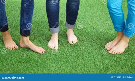 Three Women With Naked Feet Standing In Grass Stock Photo Image Of Body Lawn