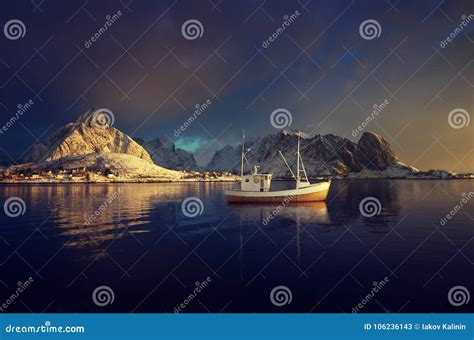 Fishing Boat and Reine Village, Lofoten Islands Stock Image - Image of ...