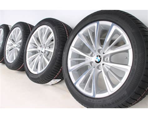 BMW Winterradsatz 5er G30 G31 18 Zoll 643 W Speiche RDC Bicolor Pirelli