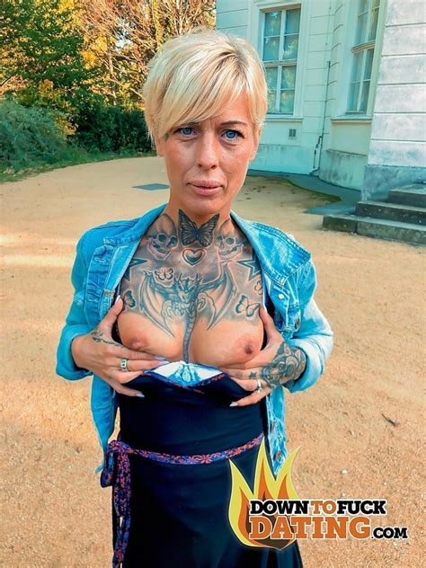 Tattooed MILF With Short Hair Fucks Her Lover 11 Photos
