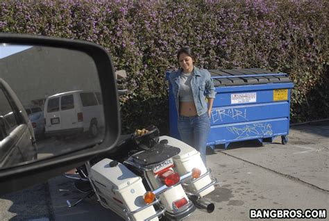 Brunette Latina Milf Evie Delatosso Poses Seductively On The Motorcycle