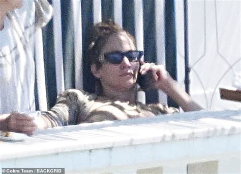 Jennifer Lopez Shows Off Her Famous Curves In A Skimpy Red Bikini While Soaking Up The Sun On