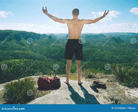 Athletic Naked Man Climbed Up Rocky Hill Shirtless Tourist Stock Photo Image Of Fitness