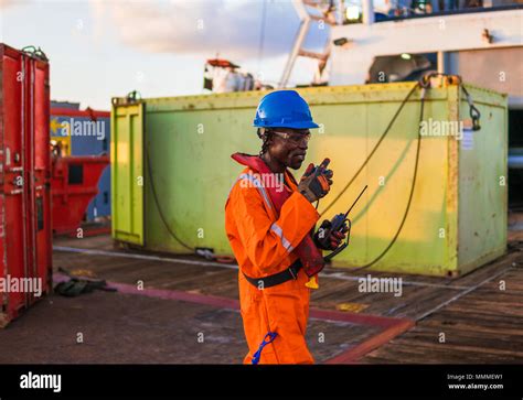 Seaman Ab Or Bosun On Deck Of Offshore Vessel Or Ship Wearing Ppe Personal Protective