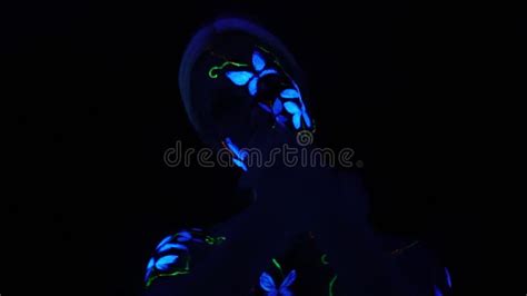 Blonde Girl With Bodypainting On Her Face Looks At Camera With Big Eyes Stock Footage Video Of