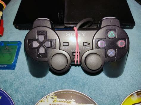 PS2 model SCPH-90004+chip+igre