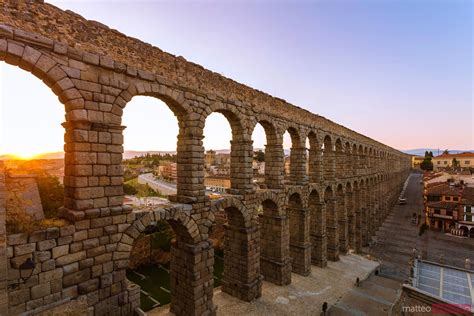- The roman aqueduct of Segovia at sunrise, Spain | Royalty Free Image
