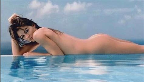 Elizabeth Hurley Shows Off In The Tinniest Yellow Bikini Whiskey Babes