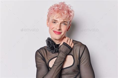 Pink Haired Stylish Gay Man Wears Makeup Captures Essence Of His Unique Identity With Every Pose