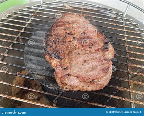 Grilled T-bone Steak on Barbecue Grill, Close Up View Stock Photo ...