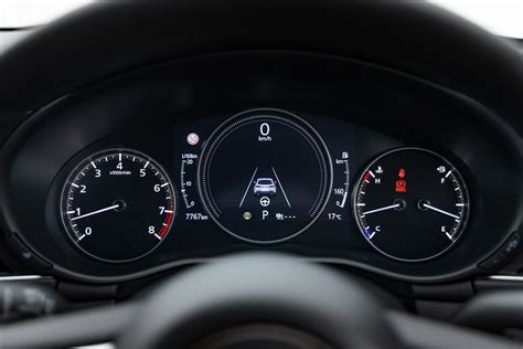 mazda  touring hatch  review carsalescomau