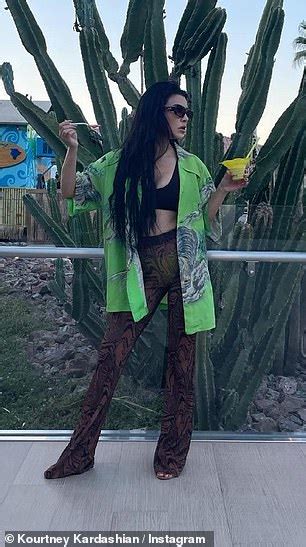 Kourtney Kardashian Sizzles In A Tiny Bronze Bikini Daily Mail Online