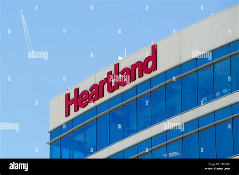 A Logo Sign Outside Of A Facility Occupied By Heartland Payment Systems