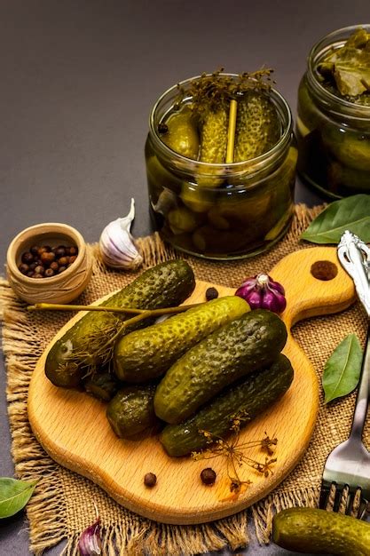 Premium Photo Marinated Pickled Cucumbers With Spices And Herbs