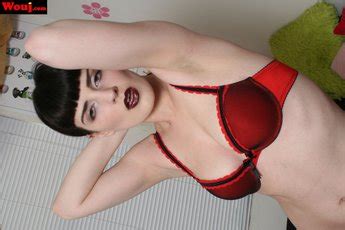 Hot Goth Chick Showing Off Her Body In Red Lingerie Photos